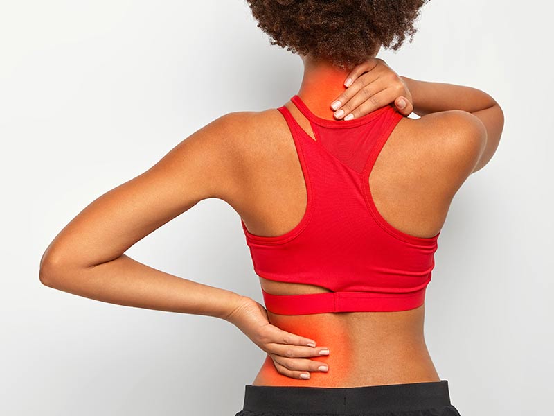 woman with thoracic spinal stenosis symptoms