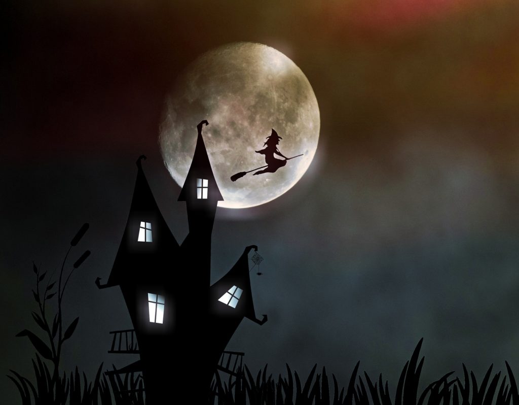 witch flying over full moon
